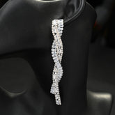 Silver Tone Twisted Baguette Crystal Drop Earrings